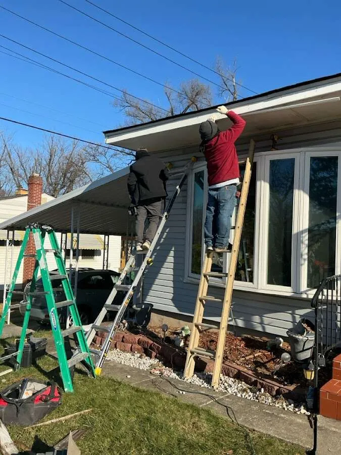 Restoration crew performing exterior repair in Plainfield